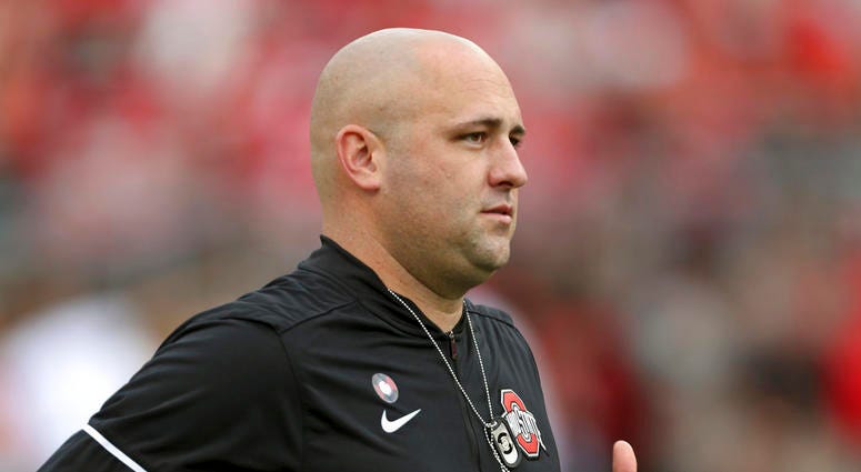 Ohio State assistant coach Zach Smith watches before the start of an NCAA college football game against Army in Columbus, Ohio. DO NOT USE