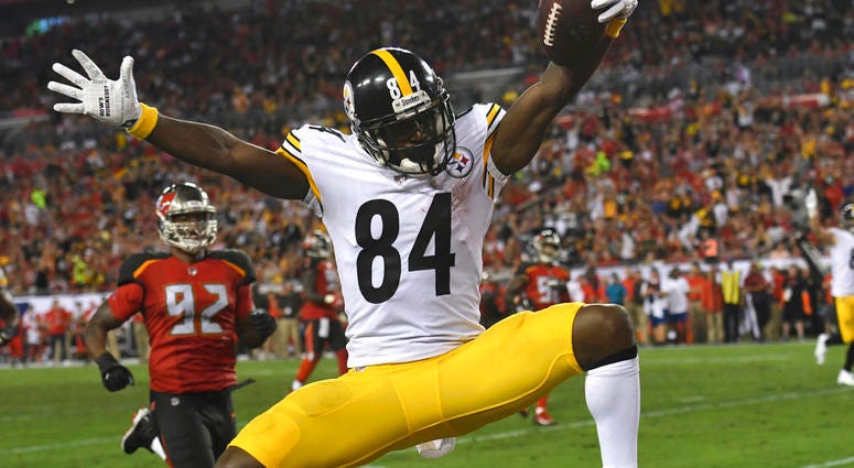 n this Monday, Sept. 24, 2018, file photo, Pittsburgh Steelers wide receiver Antonio Brown (84) celebrates after his 27-yard score against the Tampa Bay Buccaneers DO NOT USE