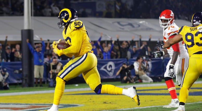 Los Angeles Rams outside linebacker Samson Ebukam (50) scores a touchdown after he recovered the ball on a fumble by Kansas City Chiefs quarterback Patrick Mahomes DO NOT USE