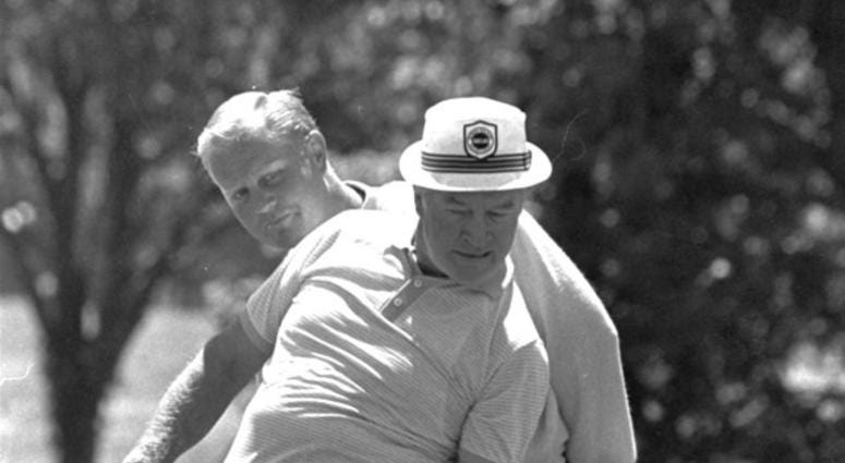 comedian Bob Hope lends aid to Jack Nicklaus in lining up Nicklaus' putt on the first green during the pro-am play of the Byron Nelson Classic in Dallas comedian Bob Hope lends aid to Jack Nicklaus in lining up Nicklaus' putt on the first green during the pro-am play of the Byron Nelson Classic in Dallas