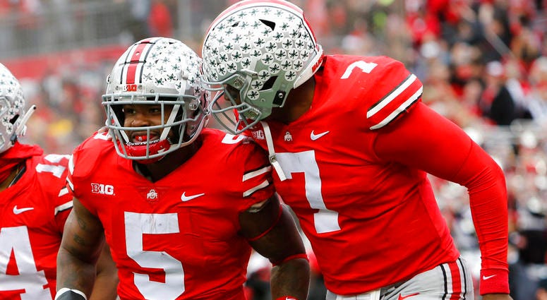 Ohio State running back Mike Weber, left, celebrates his touchdown against Michigan Ohio State running back Mike Weber, left, celebrates his touchdown against Michigan