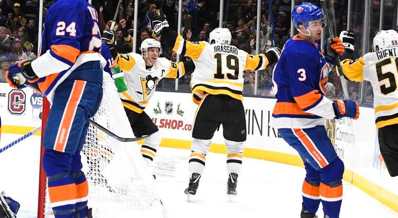 Pittsburgh Penguins center Derick Brassard (19) celebrates his goal with Penguins center Sidney Crosby Pittsburgh Penguins center Derick Brassard (19) celebrates his goal with Penguins center Sidney Crosby
