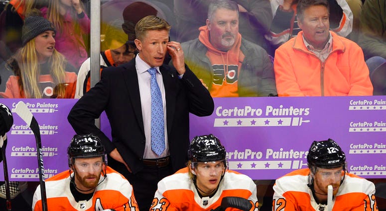 Philadelphia Flyers head coach Dave Hakstol watches from the bench during an NHL hockey game against the Ottawa Senators, in Philadelphia. The Flyers fired head coach Dave Hakstol Monday, Dec. 17, 2018. DO NOT USE