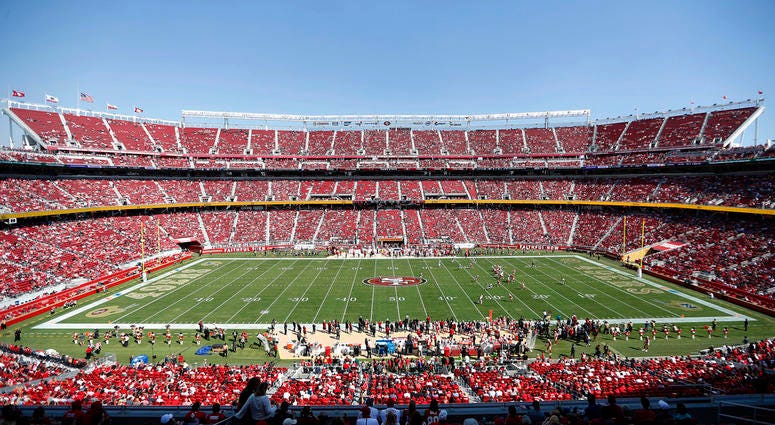 In this Oct. 7, 2018, file photo, fans watch an NFL football game between the San Francisco 49ers and the Arizona Cardinals at Levi's Stadium in Santa Clara, Calif. DO NOT USE