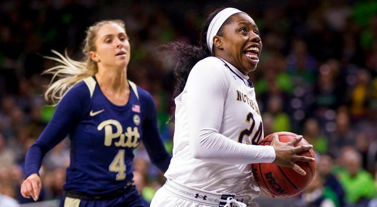 Notre Dame's Arike Ogunbowale (24) drives in on a fast break in front of Pittsburgh's Cassidy Walsh Notre Dame's Arike Ogunbowale (24) drives in on a fast break in front of Pittsburgh's Cassidy Walsh