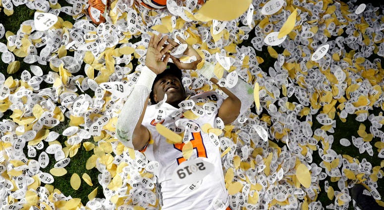Clemson's Travis Etienne celebrates after the NCAA college football playoff championship game Clemson's Travis Etienne celebrates after the NCAA college football playoff championship game