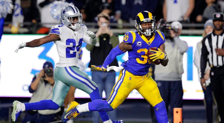Los Angeles Rams running back Todd Gurley scores past Dallas Cowboys Los Angeles Rams running back Todd Gurley scores past Dallas Cowboys