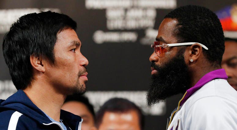 Manny Pacquiao, left, and Adrien Broner pose for photographers during a news conference Wednesday, Jan. 16, 2019, in Las Vegas. Manny Pacquiao, left, and Adrien Broner pose for photographers during a news conference Wednesday, Jan. 16, 2019, in Las Vegas.