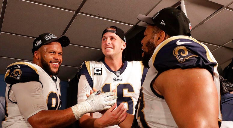 Los Angeles Rams defensive end Aaron Donald (99) Los Angeles Rams nose tackle Ndamukong Suh (93) and Los Angeles Rams quarterback Jared Goff Los Angeles Rams defensive end Aaron Donald (99) Los Angeles Rams nose tackle Ndamukong Suh (93) and Los Angeles Rams quarterback Jared Goff