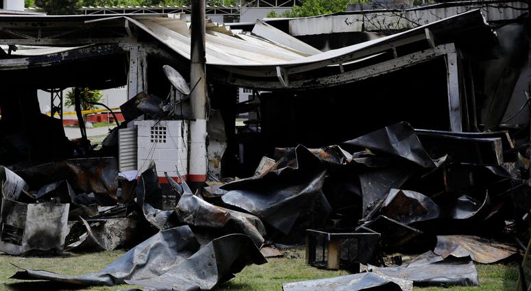 Debris from the deadly fire at the Flamengo soccer club training complex litters the ground in Rio de Janeiro, Brazil, Friday, Feb. 8, 2019 Debris from the deadly fire at the Flamengo soccer club training complex litters the ground in Rio de Janeiro, Brazil, Friday, Feb. 8, 2019
