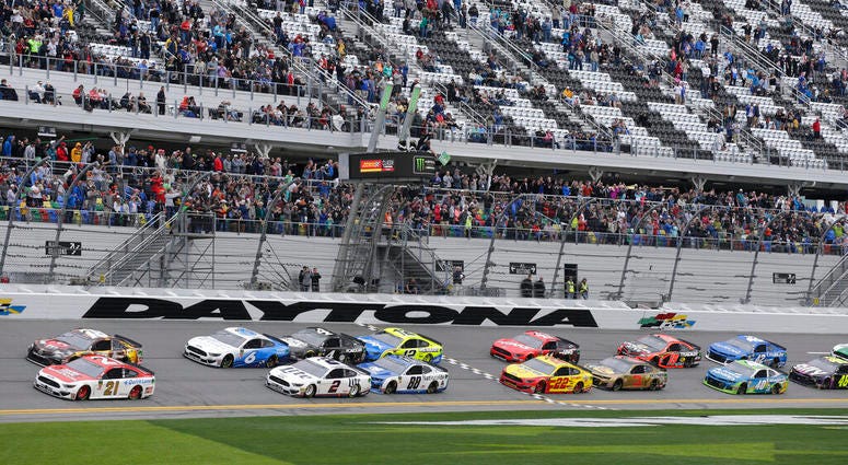 Paul Menard (21) and Kyle Busch, top left, lead the field of cars to start the NASCAR Clash auto race at Daytona International Speedway, Sunday, Feb. 10, 2019, in Daytona Beach, Fla. Paul Menard (21) and Kyle Busch, top left, lead the field of cars to start the NASCAR Clash auto race at Daytona International Speedway, Sunday, Feb. 10, 2019, in Daytona Beach, Fla.