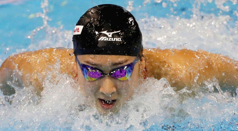 In this Dec. 11, 2016, file photo, Rikako Ikee, of Japan, competes in the women's 100-meter butterfly final at the FINA World Swimming Championships short-course Sunday, Dec. 11, 2016 in Windsor, Ontario. DO NOT USE