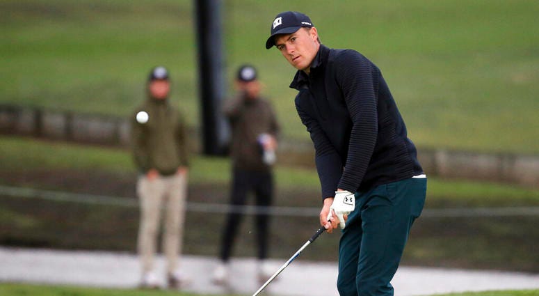 Jordan Spieth hits to the second green for a birdie during the first round of the Genesis Open golf tournament at Riviera Country Club in the Pacific Palisades area of Los Angeles AP DO NOT USE