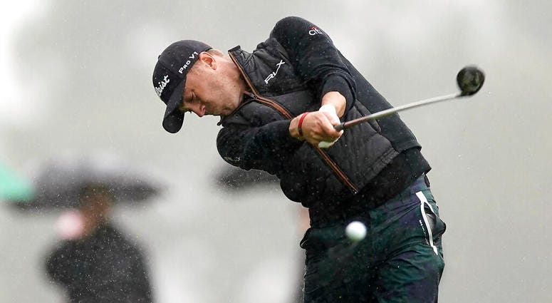 Justin Thomas hits his second shot on the 18th hole during a rain shower in the second round of the Genesis Open golf tournament at Riviera Country Club on Friday, Feb. 15, 2019, in the Pacific Palisades area of Los Angeles. Justin Thomas hits his second shot on the 18th hole during a rain shower in the second round of the Genesis Open golf tournament at Riviera Country Club on Friday, Feb. 15, 2019, in the Pacific Palisades area of Los Angeles.