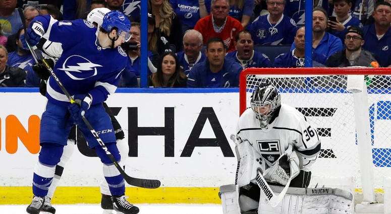 Tampa Bay Lightning center Anthony Cirelli (71) watches his deflection get past Los Angeles Kings goaltender Jack Campbell (36) AP DO NOT USE