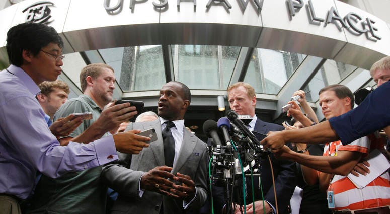 NFLPA Executive Director DeMaurice Smith, left, and NFL football Commissioner Roger Goodell speak during a news conference at the NFL Players Association in Washington, after the NFL Players Association executive board and 32 team reps voted unanimously t NFLPA Executive Director DeMaurice Smith, left, and NFL football Commissioner Roger Goodell speak during a news conference at the NFL Players Association in Washington, after the NFL Players Association executive board and 32 team reps voted unanimously t