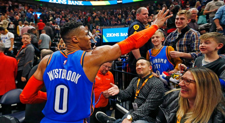 Oklahoma City Thunder guard Russell Westbrook (0) waves to the crowd as he leaves the court following an NBA basketball game against the Utah Jazz, Monday, March 11, 2019, in Salt Lake City. DO NOT USE
