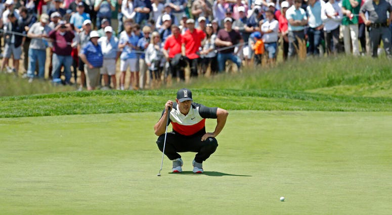 Brooks Koepka lines up a putt on the fifth green during the first round of the PGA Championship golf tournament, Thursday, May 16, 2019, at Bethpage Black in Farmingdale, N.Y. Brooks Koepka lines up a putt on the fifth green during the first round of the PGA Championship golf tournament, Thursday, May 16, 2019, at Bethpage Black in Farmingdale, N.Y.