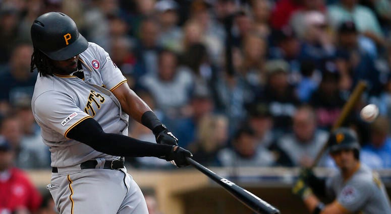 Pittsburgh Pirates' Josh Bell hits a three-run home run off a pitch by San Diego Padres' Nick Margevicius during the third inning of a baseball game in San Diego, Saturday, May 18, 2019. Pittsburgh Pirates' Josh Bell hits a three-run home run off a pitch by San Diego Padres' Nick Margevicius during the third inning of a baseball game in San Diego, Saturday, May 18, 2019.