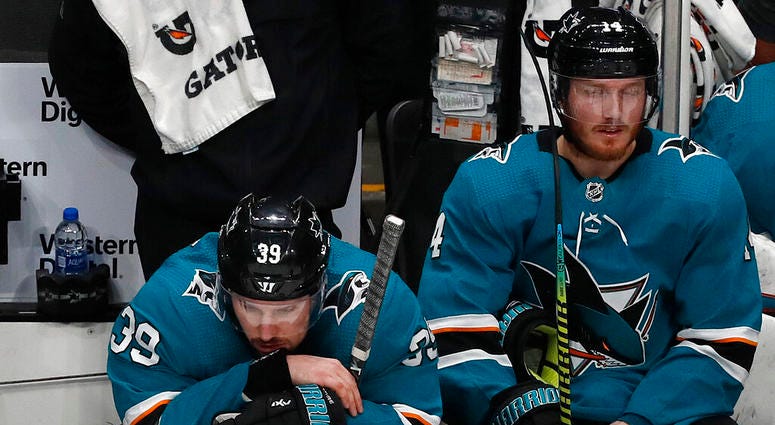 San Jose Sharks' Logan Couture (39) and Gustav Nyquist (14) react on the bench as the St. Louis Blues take a 5-0 lead in the third period in Game 5 of the NHL hockey Stanley Cup Western Conference finals in San Jose, Calif., on Sunday, May 19, 2019. San Jose Sharks' Logan Couture (39) and Gustav Nyquist (14) react on the bench as the St. Louis Blues take a 5-0 lead in the third period in Game 5 of the NHL hockey Stanley Cup Western Conference finals in San Jose, Calif., on Sunday, May 19, 2019.
