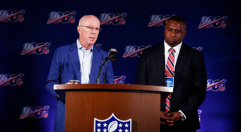 Atlanta Falcons President and CEO, Rich McKay, left, and Troy Vincent, Executive Vice President of Football Operations for the NFL, right, speak to the media during the NFL football owners meeting on Wednesday, May 22, 2019, in Key Biscayne, Fla. AP DO NOT USE