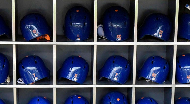 This Sept. 28, 2018 photo shows batting helmets in a rack before a Major League Baseball game in New York. AP DO NOT USE