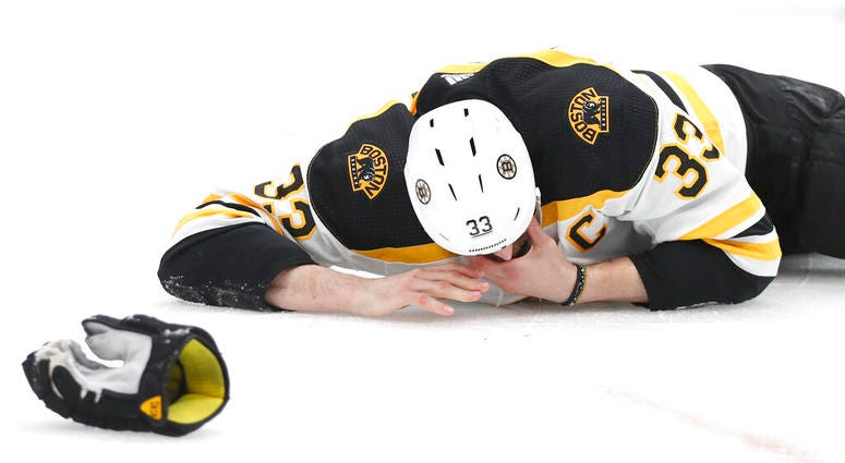 Boston Bruins defenseman Zdeno Chara, of Slovakia, lies on the ice after getting hit in the face with the puck during the second period of Game 4 of the NHL hockey Stanley Cup Final against the St. Louis Blues Monday, June 3, 2019, in St. Louis. ( Boston Bruins defenseman Zdeno Chara, of Slovakia, lies on the ice after getting hit in the face with the puck during the second period of Game 4 of the NHL hockey Stanley Cup Final against the St. Louis Blues Monday, June 3, 2019, in St. Louis. (