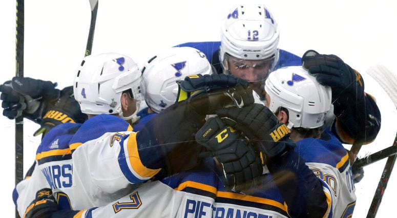 St. Louis Blues' Ryan O'Reilly, right, celebrates his goal against the Boston Bruins with teammates during the second period in Game 5 of the NHL hockey Stanley Cup Final, Thursday, June 6, 2019, in Boston. St. Louis Blues' Ryan O'Reilly, right, celebrates his goal against the Boston Bruins with teammates during the second period in Game 5 of the NHL hockey Stanley Cup Final, Thursday, June 6, 2019, in Boston.