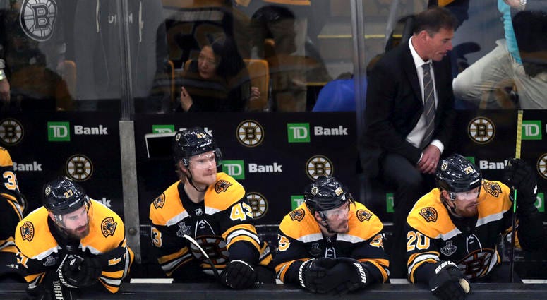 Boston Bruins players and head coach Bruce Cassidy, right rear, watch the final minutes in Game 5 of the NHL hockey Stanley Cup Final against the St. Louis Blues, Thursday, June 6, 2019, in Boston. Boston Bruins players and head coach Bruce Cassidy, right rear, watch the final minutes in Game 5 of the NHL hockey Stanley Cup Final against the St. Louis Blues, Thursday, June 6, 2019, in Boston.