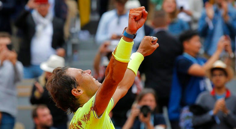 Spain's Rafael Nadal celebrates his record 12th French Open tennis tournament title after winning his men's final match against Austria's Dominic Thiem in four sets, 6-3, 5-7, 6-1, 6-1, at the Roland Garros stadium in Paris, Sunday, June 9, 2019. Spain's Rafael Nadal celebrates his record 12th French Open tennis tournament title after winning his men's final match against Austria's Dominic Thiem in four sets, 6-3, 5-7, 6-1, 6-1, at the Roland Garros stadium in Paris, Sunday, June 9, 2019.