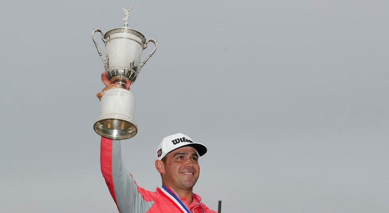 Gary Woodland celebrates with the trophy after winning the U.S. Open Championship golf tournament Sunday, June 16, 2019, in Pebble Beach, Calif. Gary Woodland celebrates with the trophy after winning the U.S. Open Championship golf tournament Sunday, June 16, 2019, in Pebble Beach, Calif.