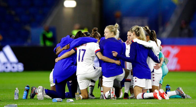 United States players embrace following their team's 2-0 win over Sweden in the Women's World Cup Group F soccer match at Stade Océane, in Le Havre, France, Thursday, June 20, 2019. United States players embrace following their team's 2-0 win over Sweden in the Women's World Cup Group F soccer match at Stade Océane, in Le Havre, France, Thursday, June 20, 2019.