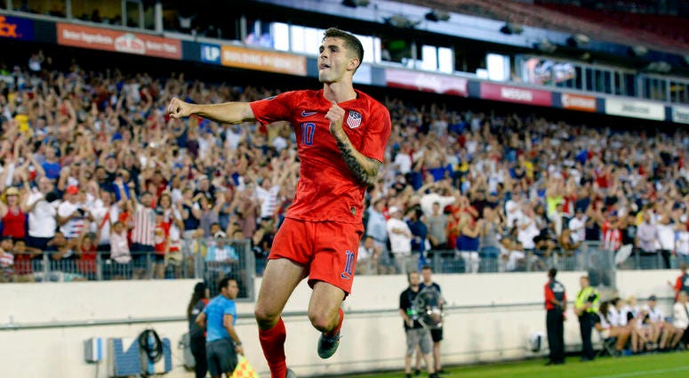 United States midfielder Christian Pulisic celebrates after scoring a goal against Jamaica during the second half of a CONCACAF Gold Cup semifinal soccer match Wednesday, July 3, 2019, in Nashville, Tenn. The United States won 3-1. ( United States midfielder Christian Pulisic celebrates after scoring a goal against Jamaica during the second half of a CONCACAF Gold Cup semifinal soccer match Wednesday, July 3, 2019, in Nashville, Tenn. The United States won 3-1. (