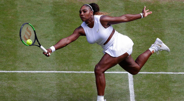 United States' Serena Williams returns to Czech Republic's Barbora Strycova during a women's singles semifinal match on day ten of the Wimbledon Tennis Championships in London, Thursday, July 11, 2019 AP DO NOT USE
