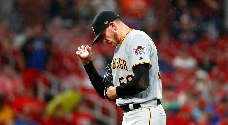 Pittsburgh Pirates starting pitcher Joe Musgrove pauses on the mound after giving up a single to St. Louis Cardinals' Tyler O'Neill during the third inning of a baseball game Monday, July 15, 2019, in St. Louis.