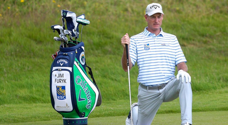 Jim Furyk of the United States stretches on the 1st fairway during a practice round for the British Open Golf championships at Royal Port Rush golf course in Northern Ireland, Tuesday, July 16, 2019 AP DO NOT USE