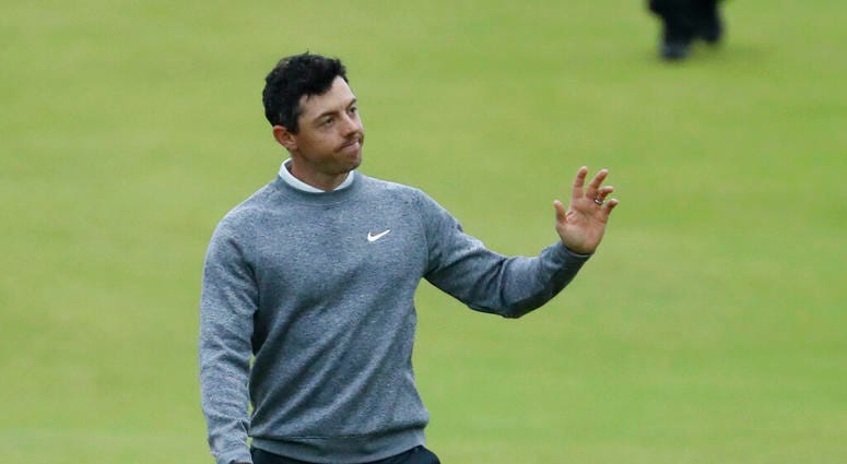 Northern Ireland's Rory McIlroy waves to the crowd as he walks onto the 18th green during the second round of the British Open Golf Championships at Royal Portrush in Northern Ireland, Friday, July 19, 2019. Northern Ireland's Rory McIlroy waves to the crowd as he walks onto the 18th green during the second round of the British Open Golf Championships at Royal Portrush in Northern Ireland, Friday, July 19, 2019.