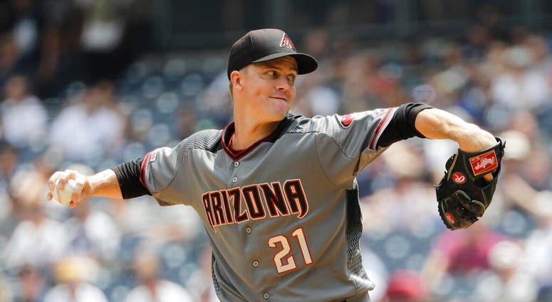 Arizona Diamondbacks' Zack Greinke delivers a pitch during the first inning of a baseball game against the New York Yankees Wednesday, July 31, 2019, in New York. Arizona Diamondbacks' Zack Greinke delivers a pitch during the first inning of a baseball game against the New York Yankees Wednesday, July 31, 2019, in New York.