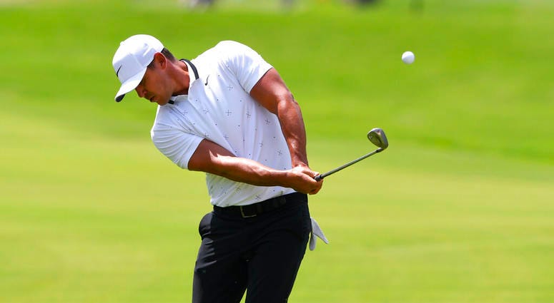 Brooks Koepka chips to the fourth green during the first round of the Tour Championship golf tournament Friday, Aug. 23, 2019, in Atlanta. Brooks Koepka chips to the fourth green during the first round of the Tour Championship golf tournament Friday, Aug. 23, 2019, in Atlanta.