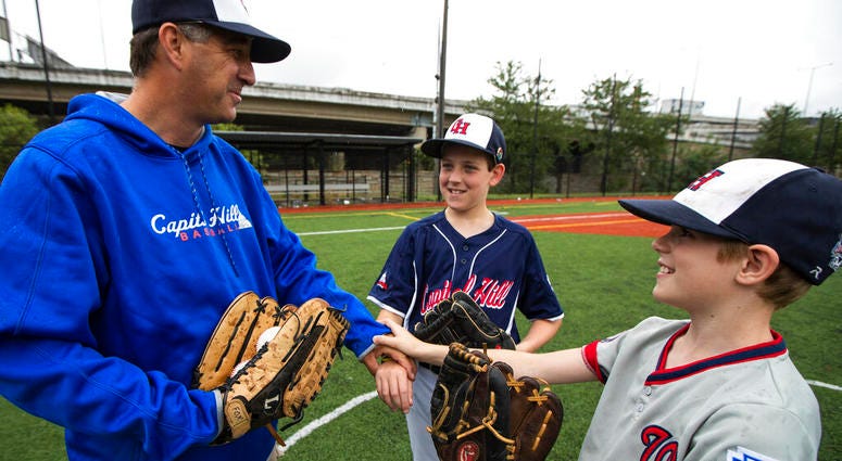 David Fox and his wife, Mary Ann, have a rule for their sons, 11-year-old Dewey and 8-year-old Jimmy: They have to play a team sport. David Fox and his wife, Mary Ann, have a rule for their sons, 11-year-old Dewey and 8-year-old Jimmy: They have to play a team sport.