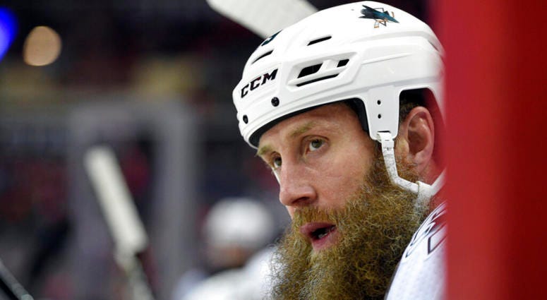 In this Dec. 4, 2017, file photo, San Jose Sharks center Joe Thornton (19) looks on from the bench during the first period of an NHL hockey game against the Washington Capitals in Washington. AP DO NOT USE