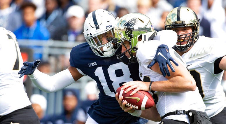 Penn State defensive end Shaka Toney (18) sacks Purdue quarterback Jack Plummer (13) in the first quarter of an NCAA college football game in State College, Pa., on Saturday, Oct. 5, 2019. Penn State defensive end Shaka Toney (18) sacks Purdue quarterback Jack Plummer (13) in the first quarter of an NCAA college football game in State College, Pa., on Saturday, Oct. 5, 2019.