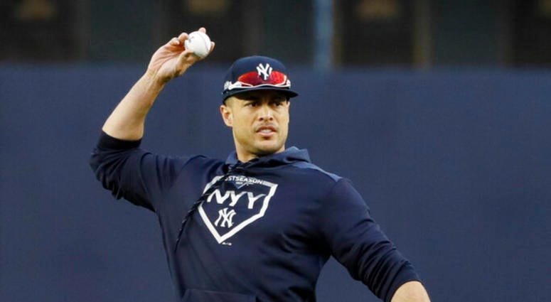 New York Yankees left fielder Giancarlo Stanton warms up during batting practice before Game 4 of baseball's American League Championship Series against the Houston Astros Thursday, Oct. 17, 2019, in New York. New York Yankees left fielder Giancarlo Stanton warms up during batting practice before Game 4 of baseball's American League Championship Series against the Houston Astros Thursday, Oct. 17, 2019, in New York.