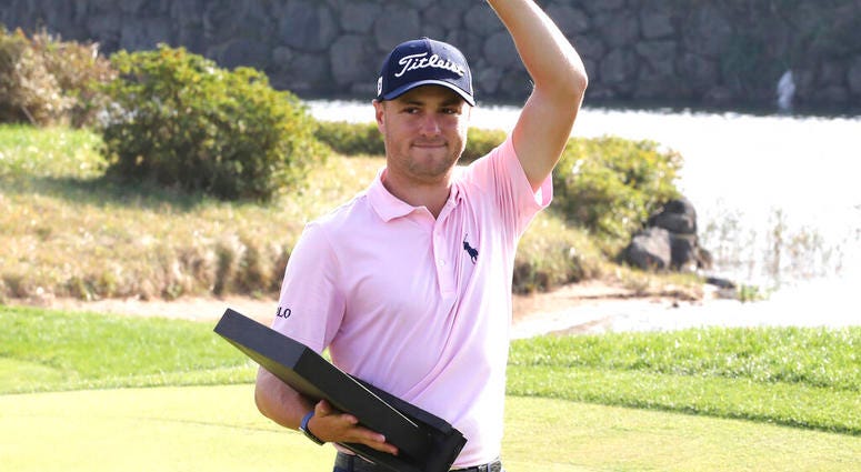 Justin Thomas of the United States waves with his trophy after winning the CJ Cup PGA golf tournament at Nine Bridges on Jeju Island, South Korea, Sunday, Oct. 20, 2019. Justin Thomas of the United States waves with his trophy after winning the CJ Cup PGA golf tournament at Nine Bridges on Jeju Island, South Korea, Sunday, Oct. 20, 2019.
