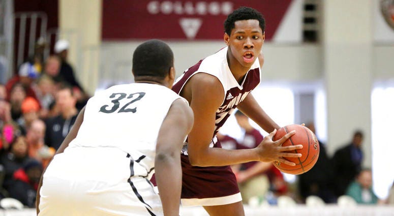 In this Jan. 14, 2017, photo, St. Anthony's Charles Bassey (23) in action against Hudson Catholic during a high school basketball game at the 2017 Hoophall Classic in Springfield, MA. AP DO NOTUSE