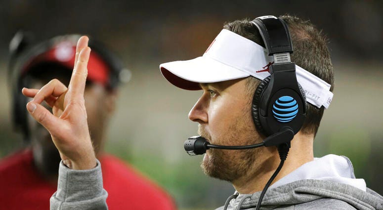 Oklahoma head coach Lincoln Riley signals in a play from the sideline during the second half of an NCAA college football game against Baylor in Waco, Texas, Saturday, Nov. 16, 2019. Oklahoma head coach Lincoln Riley signals in a play from the sideline during the second half of an NCAA college football game against Baylor in Waco, Texas, Saturday, Nov. 16, 2019.