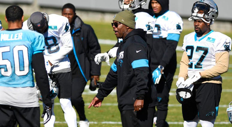 Carolina Panthers interim head coach Perry Fewell calls the team to huddle during NFL football practice at the team's training facility, Wednesday, Dec. 4, 2019, in Charlotte, N.C. Carolina Panthers interim head coach Perry Fewell calls the team to huddle during NFL football practice at the team's training facility, Wednesday, Dec. 4, 2019, in Charlotte, N.C.
