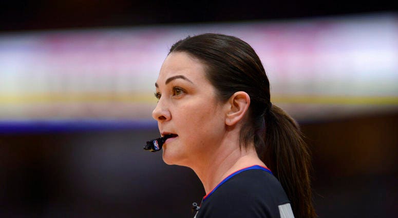 Referee Lauren Holtkamp-Sterling watches during the first half of an NBA basketball game between the Chicago Bulls and the Golden State Warriors on Friday, Dec. 6, 2019, in Chicago. This is Holtkamp-Sterling's first game back since giving birth. Referee Lauren Holtkamp-Sterling watches during the first half of an NBA basketball game between the Chicago Bulls and the Golden State Warriors on Friday, Dec. 6, 2019, in Chicago. This is Holtkamp-Sterling's first game back since giving birth.