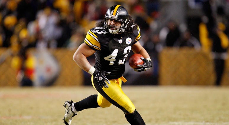 PITTSBURGH - JANUARY 18: Troy Polamalu #43 of the Pittsburgh Steelers returns an interception 40 yards for a touchdown against the Baltimore Ravens during the fourth quarter of the AFC championship game on January 18, 2009 at Heinz Field in Pittsburgh