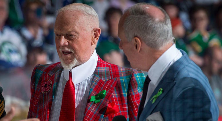 REGINA, SK - MAY 21: Don Cherry and Ron MacLean of Coaches Corner stand on the ice at the start of the game between Hamilton Bulldogs and the Swift Current Broncos at Brandt Centre - Evraz Place on May 21, 2018 in Regina, Canada.